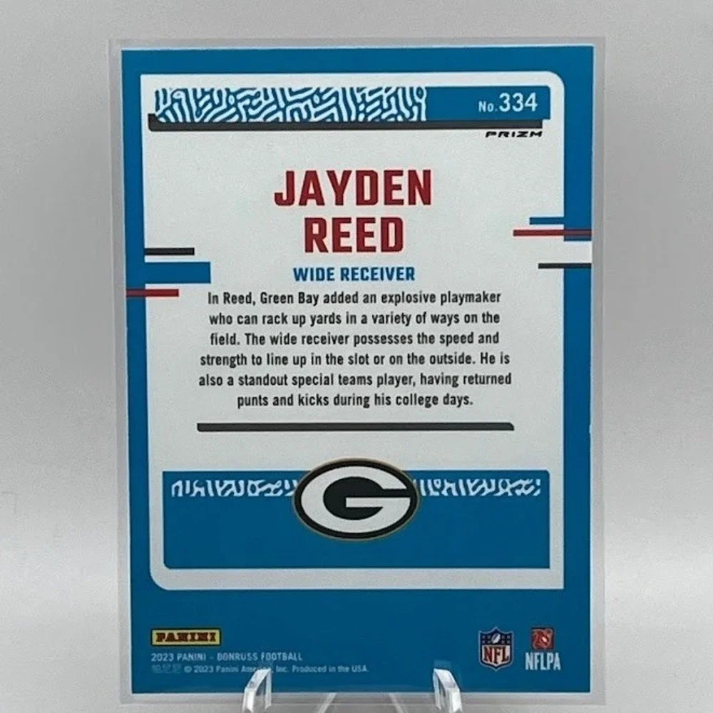 Jayden Reed Pink Velocity Prizm 2023 Panini Donruss Optic 334 Green Bay Packers